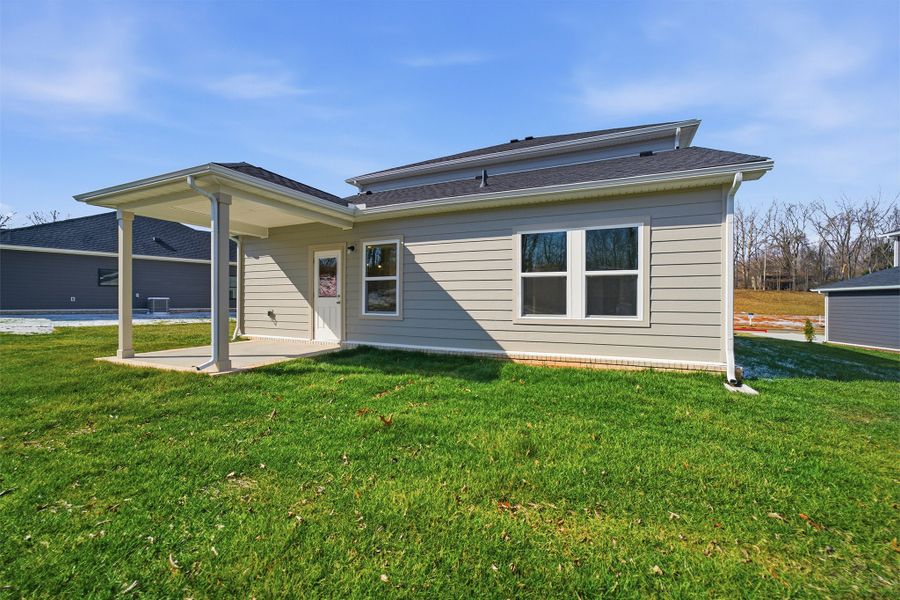 Exterior details and patio area of a home in Brush Creek, Fairview (Image 4).