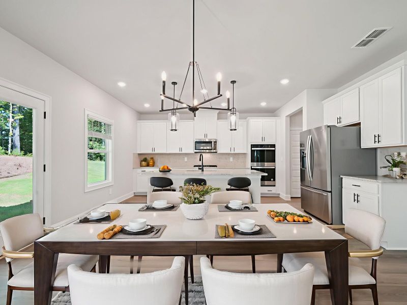 Furnished interior view inside a new home in Martin Springs - Estate Series, Lawrenceville (Image 4).