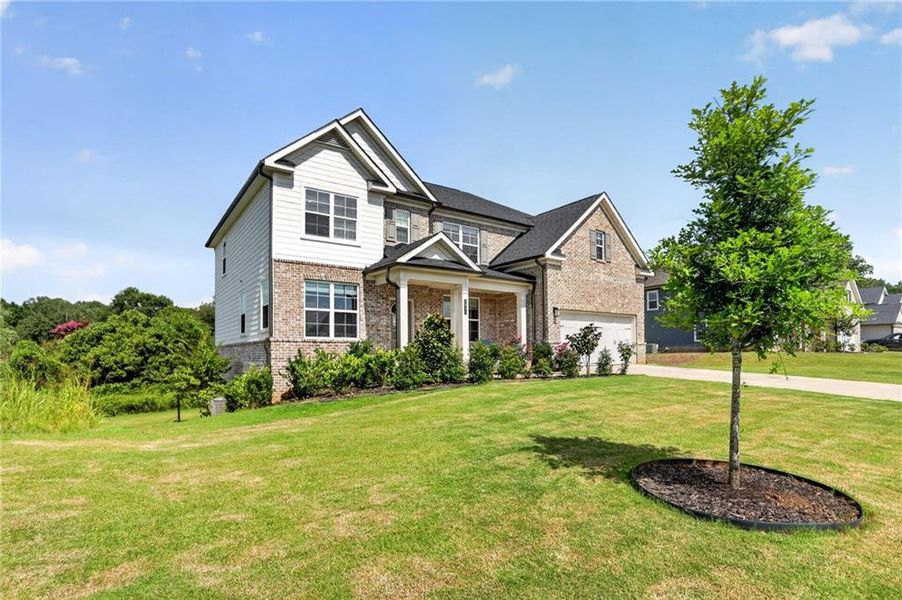 Front exterior of a new home in , Dawsonville, GA, highlighting curb appeal (Image 2). Front exterior of a new home in , Dawsonville, GA, highlighting curb appeal (Image 2).
