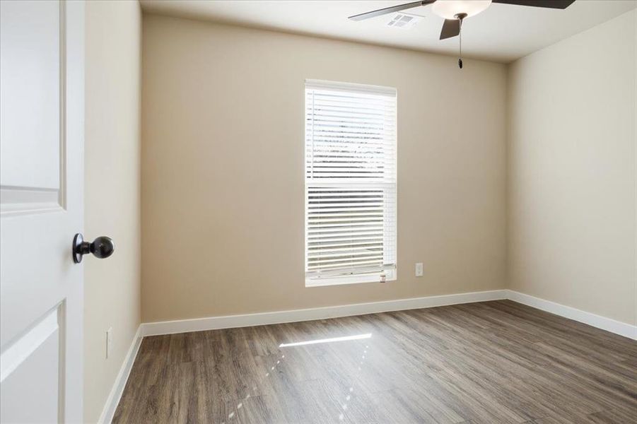 Spacious, unfurnished interior of a new home in Miller Street Cottages, Denison (Image 22).