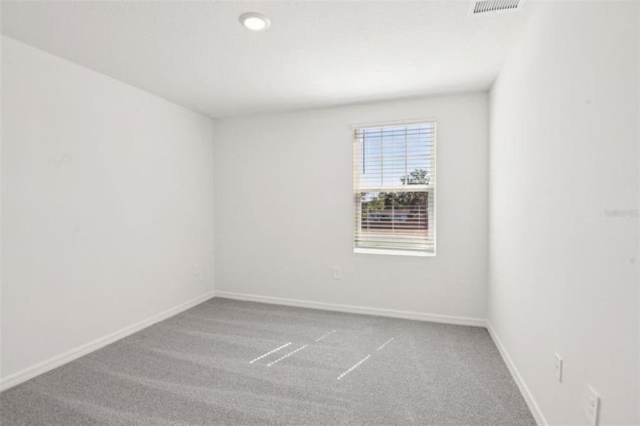 Spacious, unfurnished interior of a new home in Hilltop Vistas, Dade City (Image 28).