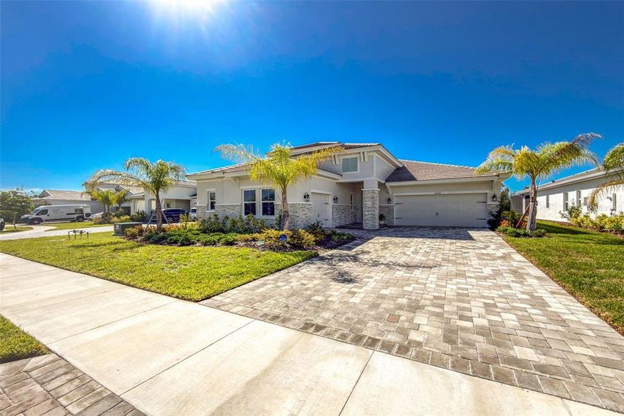 Front exterior of a new home in , Venice, FL, highlighting curb appeal (Image 1). Front exterior of a new home in , Venice, FL, highlighting curb appeal (Image 1).