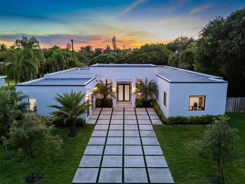 Front exterior of a new home in , Miami, FL, highlighting curb appeal (Image 26).