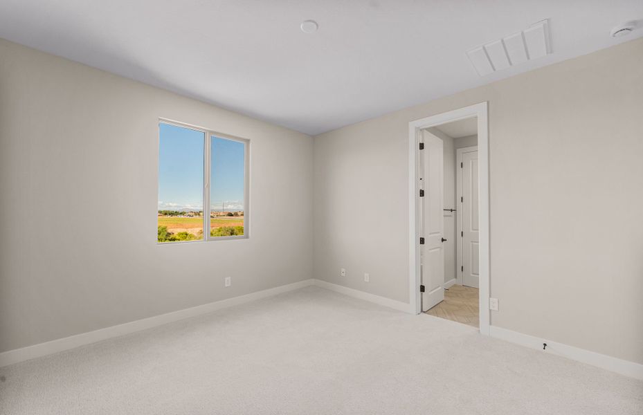 Spacious, unfurnished interior of a new home in Legado West, Queen Creek (Image 23).