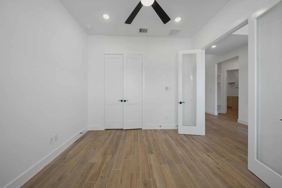 Representative unfurnished interior of a home built from the Waterloo by Chesmar Homes in Lakes of Cane Island, Katy (Image 12). Representative unfurnished interior of a home built from the Waterloo by Chesmar Homes in Lakes of Cane Island, Katy (Image 12).