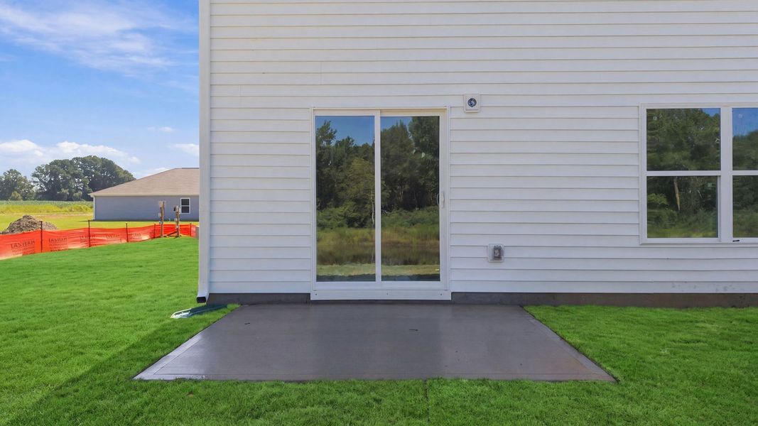 Exterior details and patio area of a home in Hobbs Farm, Ayden (Image 21).