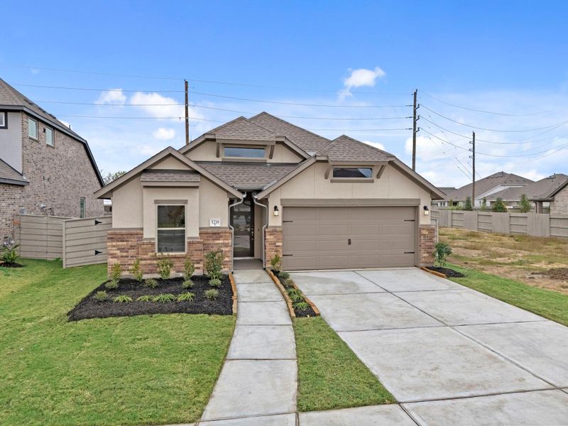 Front exterior of a new home in Pomona 50' & 55', Manvel, TX, highlighting curb appeal (Image 23).