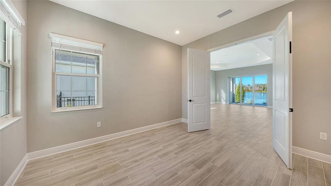 Spacious, unfurnished interior of a new home in Wildleaf, Parrish (Image 42).