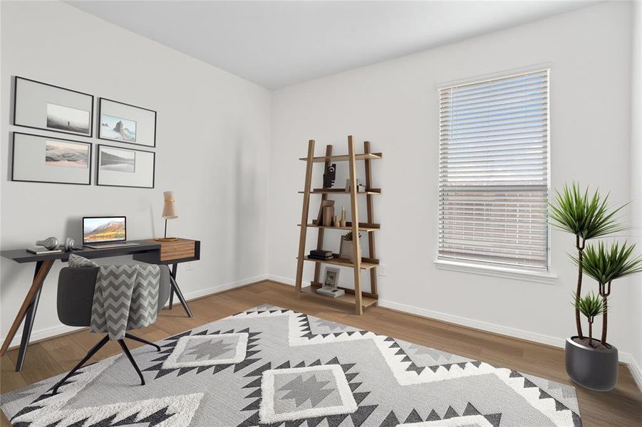 Quietly nestled in front of the home is the handsome home office or formal dining room. Featuring gorgeous flooring, custom paint and a large window.