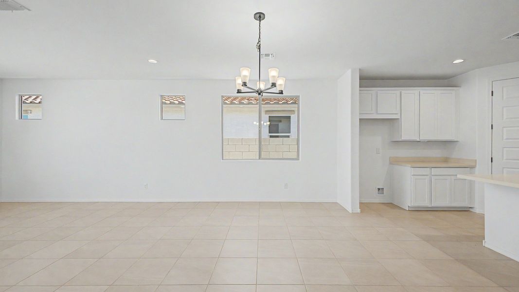 Representative furnished interior of a home built from the Acacia II by DRB Homes in Apache Farms, Buckeye (Image 9).
