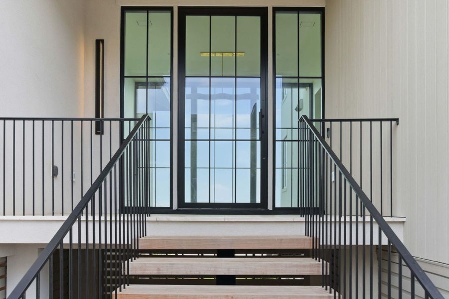 Exterior details and patio area of a home in , Sullivan's Island (Image 3).