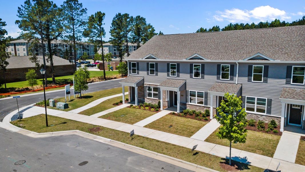 Representative exterior photo of a completed home built from the PEARSON II by D.R. Horton in Clock Road Townhomes, New Bern, NC (Image 24). Representative exterior photo of a completed home built from the PEARSON II by D.R. Horton in Clock Road Townhomes, New Bern, NC (Image 24).