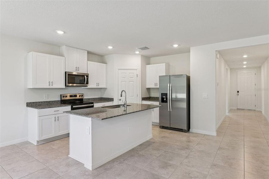 Furnished interior view inside a new home in Bradbury Creek - Signature Series, Haines City (Image 11).