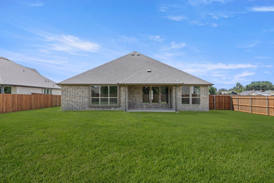 Exterior details and patio area of a home in Lovers Landing, Forney (Image 4).