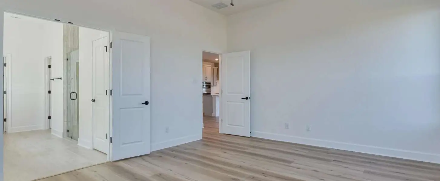 Representative unfurnished interior of a home built from the Barnett by Ashton Woods in Megan's Landing, Castroville (Image 21). Representative unfurnished interior of a home built from the Barnett by Ashton Woods in Megan's Landing, Castroville (Image 21).