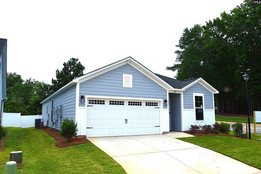 Front exterior of a new home in Bickley Station, Irmo, SC, highlighting curb appeal (Image 20).