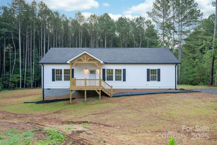 Front exterior of a new home in , Statesville, NC, highlighting curb appeal (Image 21).