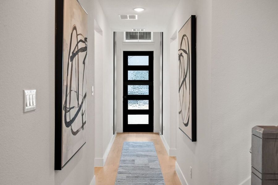 Furnished interior in a model home at Enclave 35s in Frisco (Image 11).