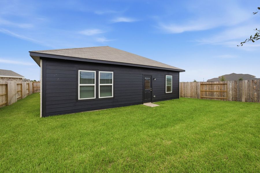 Exterior details and patio area of a home in Harvest Pointe, Needville (Image 3).