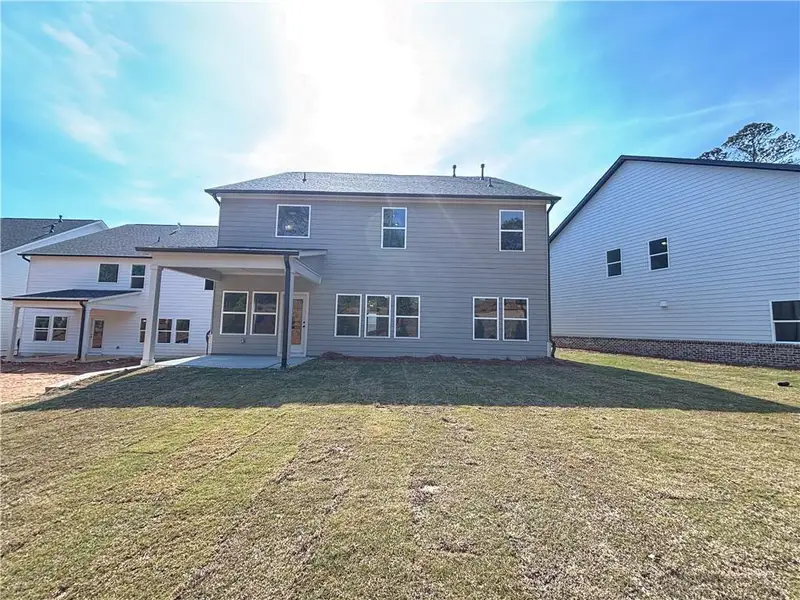 Exterior details and patio area of a home in Arbors at Richland Creek, Buford (Image 4).