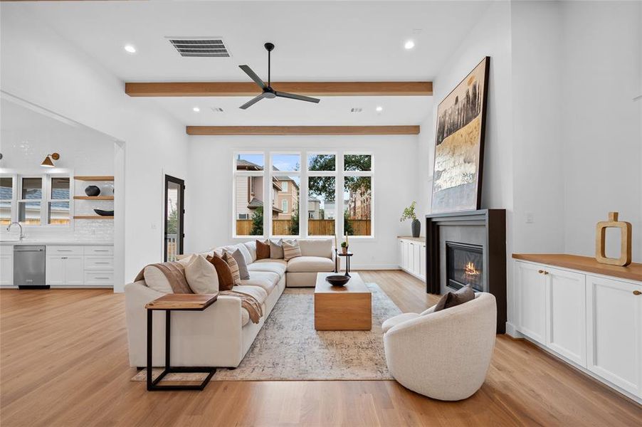 Seamless open floor plan from dining room to great room to kitchen. Lots of natural light throughout home.