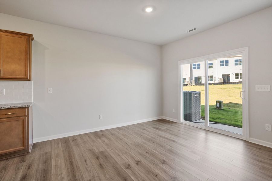 Spacious, unfurnished interior of a new home in West Main Townhomes, Sanford (Image 17).