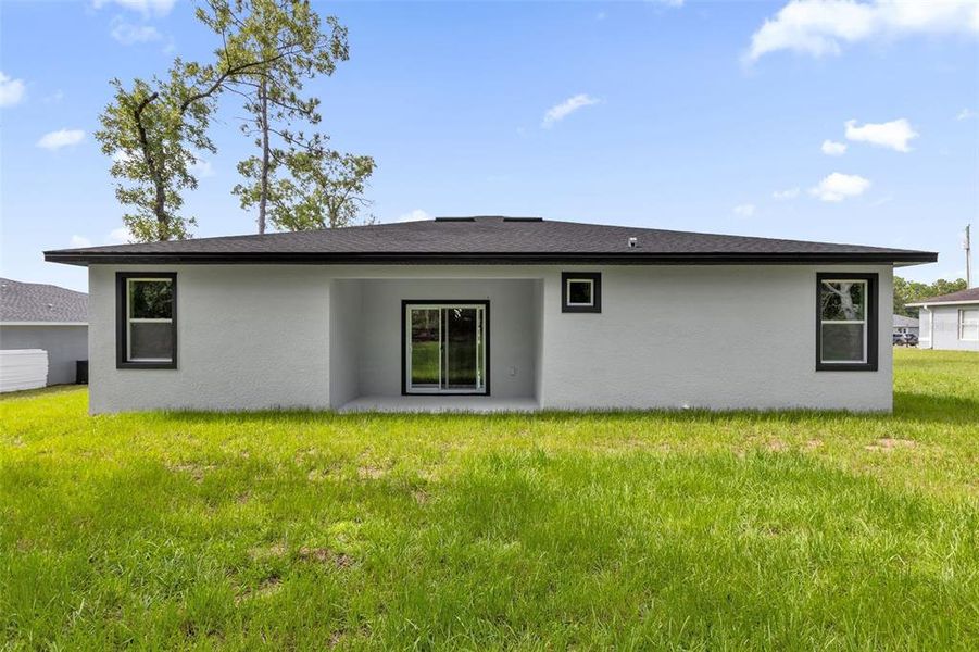 Exterior details and patio area of a home in , Ocala (Image 4).