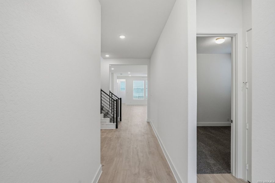 Spacious, unfurnished interior of a new home in Prominence, San Antonio (Image 38).