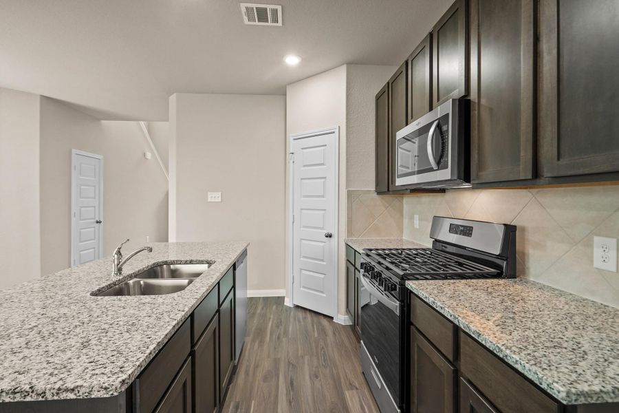 Furnished interior view inside a new home in Ridgeland Hills, Willis (Image 5). Furnished interior view inside a new home in Ridgeland Hills, Willis (Image 5).