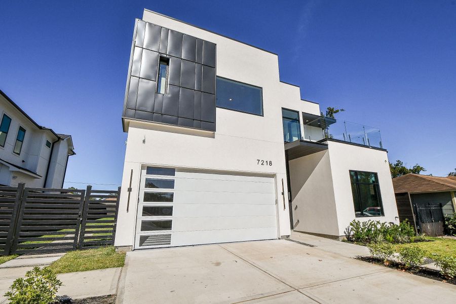 Front exterior of a new home in , Houston, TX, highlighting curb appeal (Image 1).