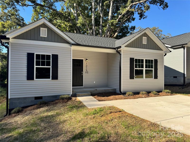 Front exterior of a new home in , Gastonia, NC, highlighting curb appeal (Image 2). Front exterior of a new home in , Gastonia, NC, highlighting curb appeal (Image 2).
