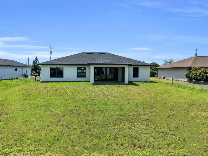 Exterior details and patio area of a home in , Lehigh Acres (Image 4).