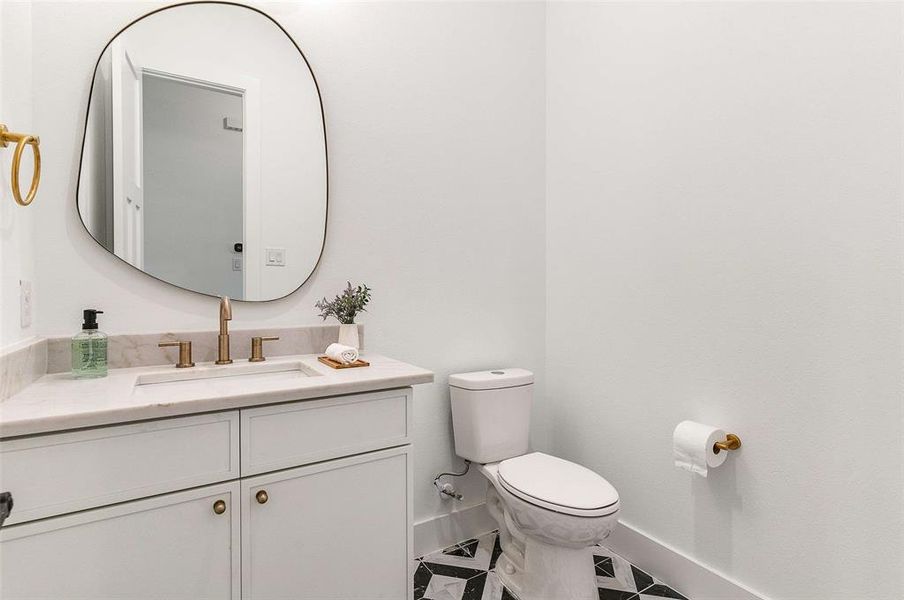 Bathroom featuring toilet and vanity