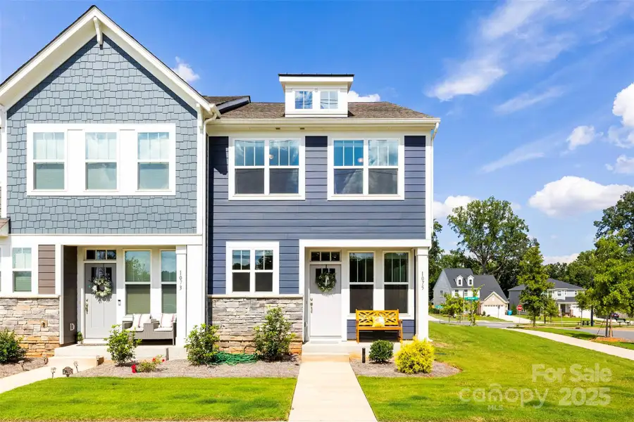 Front exterior of a new home in , Belmont, NC, highlighting curb appeal (Image 1).