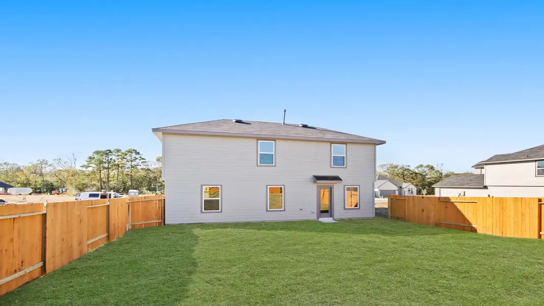 Exterior details and patio area of a home in Lexington Heights, Willis (Image 3).