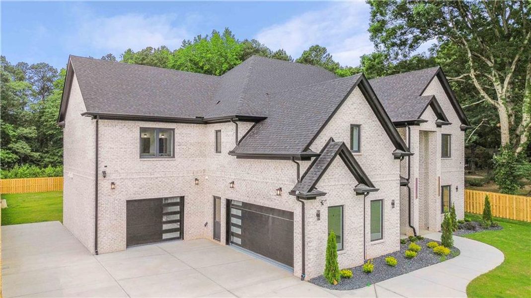 Front exterior of a new home in , Lawrenceville, GA, highlighting curb appeal (Image 26).