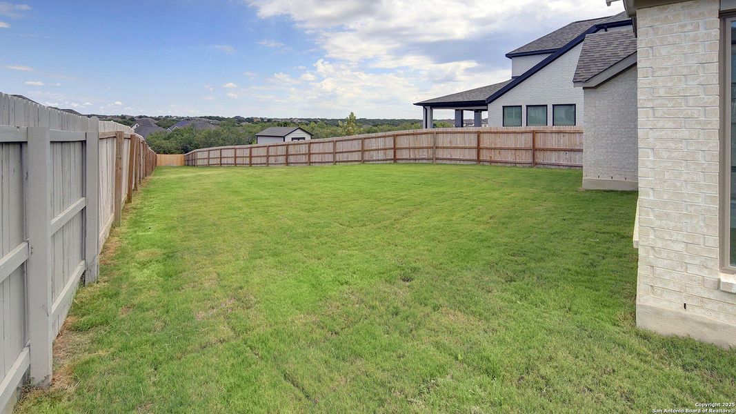 Front exterior of a new home in Stevens Ranch 55', San Antonio, TX, highlighting curb appeal (Image 23).