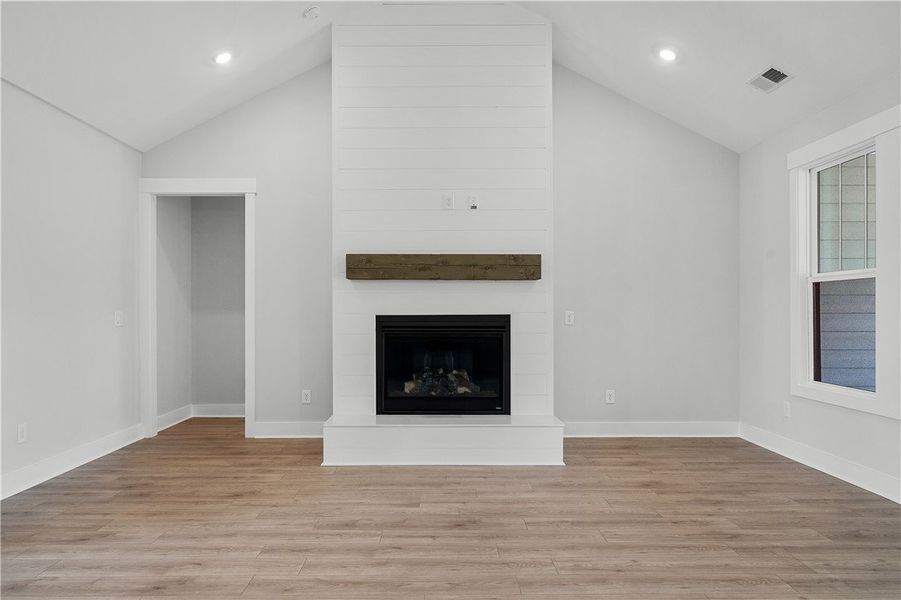 A striking fireplace with a shiplap surround ancho A striking fireplace with a shiplap surround ancho