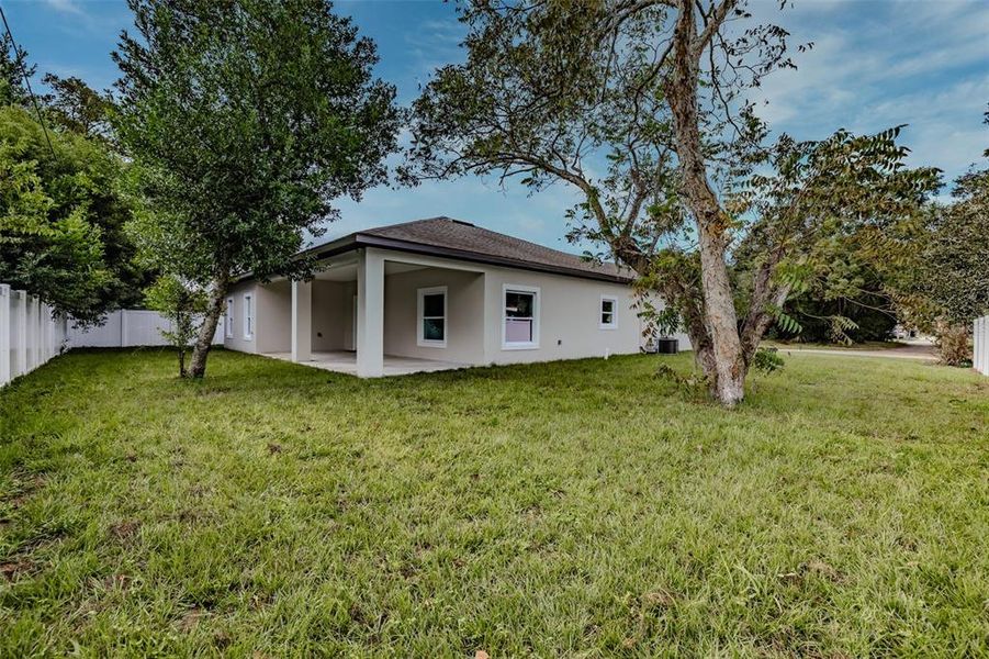 Exterior details and patio area of a home in , New Port Richey (Image 24).
