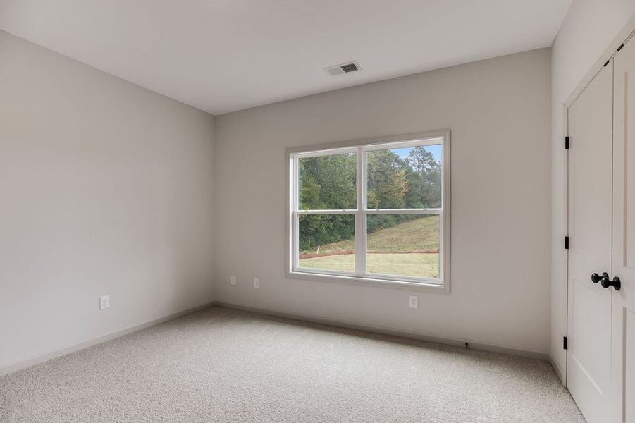 Spacious, unfurnished interior of a new home in Parmer Farms, Roopville (Image 33).
