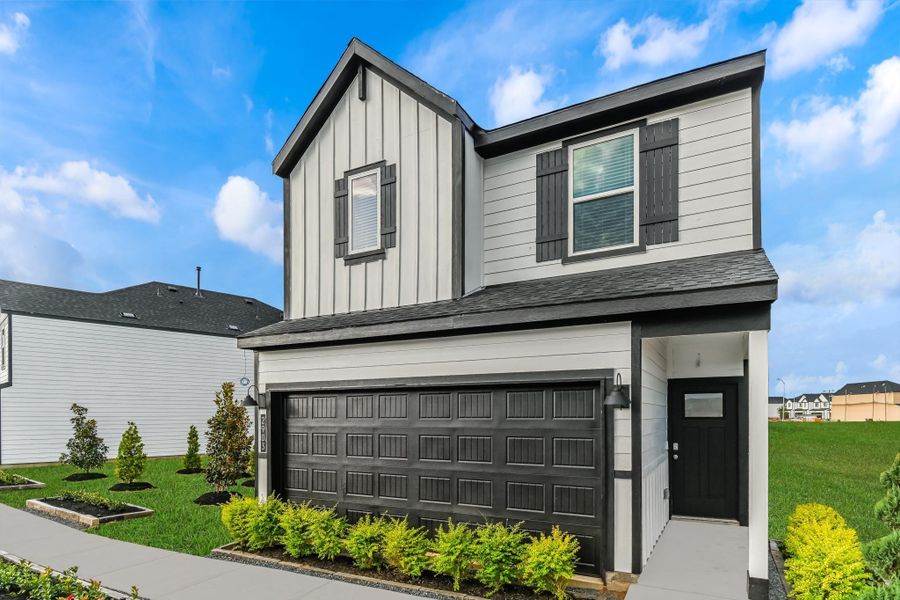 Front exterior of a new home in City Gate North, Houston, TX, highlighting curb appeal (Image 2). Front exterior of a new home in City Gate North, Houston, TX, highlighting curb appeal (Image 2).