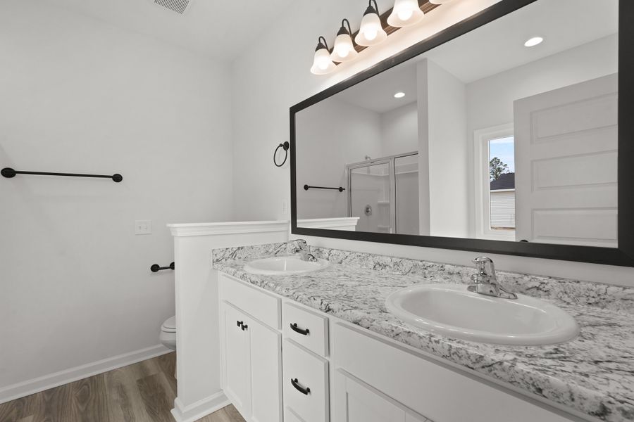 Representative furnished interior of a home built from the The Stafford by RTS Homes in The Pointe at Villages on Marne, Hinesville (Image 11).