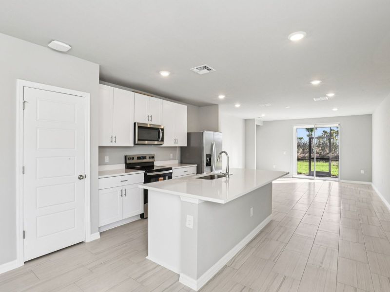 Furnished interior view inside a new home in Crescent Lakes - Premier Series, Punta Gorda (Image 4). Furnished interior view inside a new home in Crescent Lakes - Premier Series, Punta Gorda (Image 4).