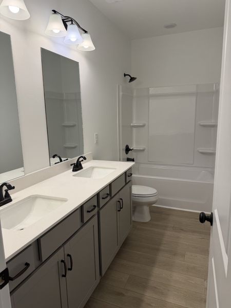 Furnished interior view inside a new home in Marlin Pointe, White House (Image 4).