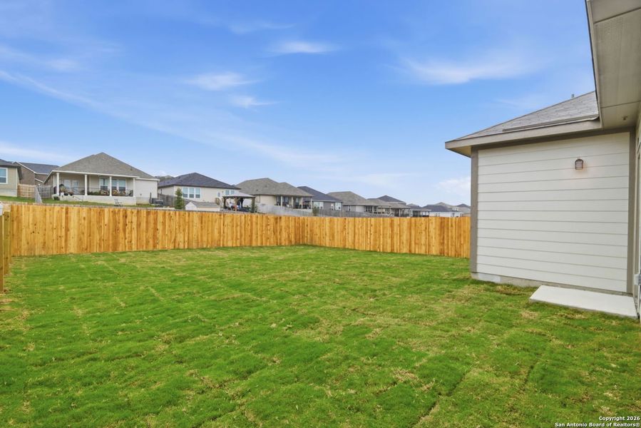 Exterior details and patio area of a home in Hunters Ranch, San Antonio (Image 25).