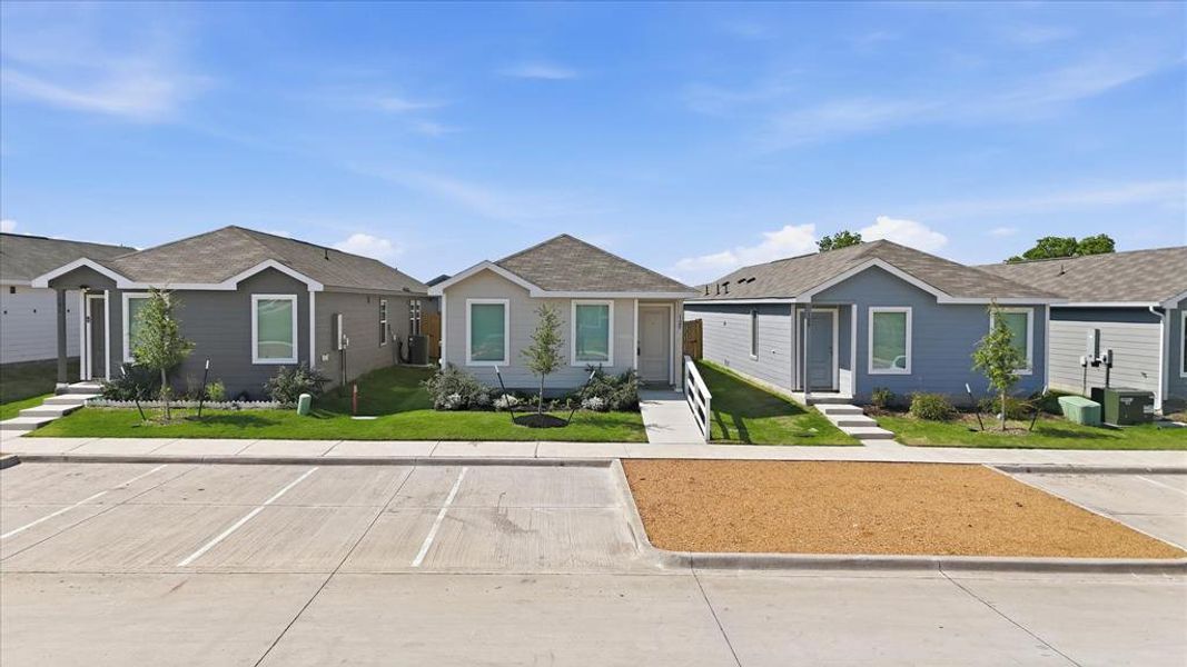 Front exterior of a new home in Tillage Farms, Princeton, TX, highlighting curb appeal (Image 2). Front exterior of a new home in Tillage Farms, Princeton, TX, highlighting curb appeal (Image 2).