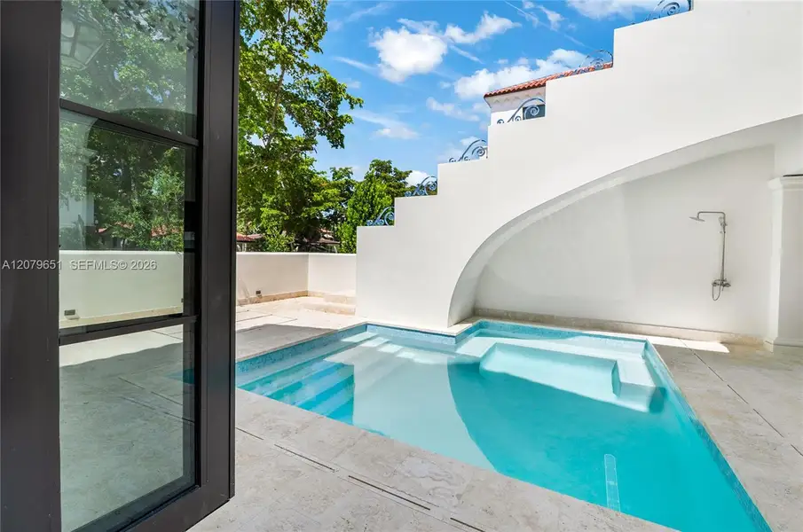 Exterior details and patio area of a home in , Coral Gables (Image 4).