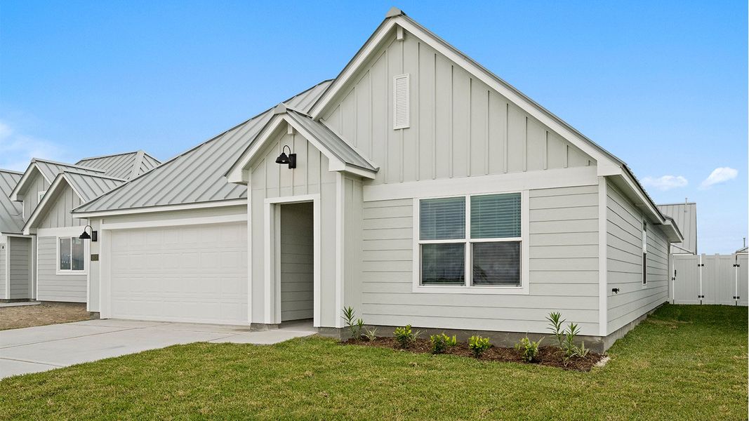Front exterior of a new home in The Islands of Rockport, Rockport, TX, highlighting curb appeal (Image 2).