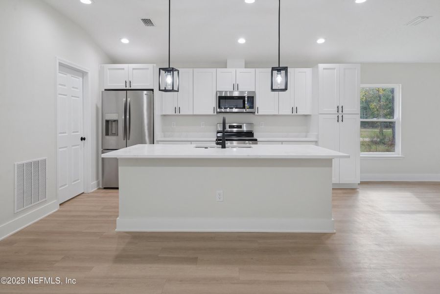 Furnished interior view inside a new home in , Florahome (Image 6).