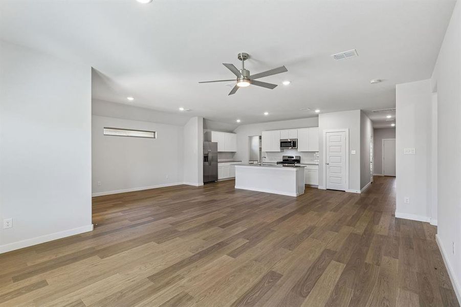 Open Floor Plan in the Harrison home plan by Trophy Signature Homes – REPRESENTATIVE PHOTO